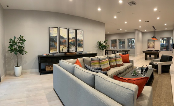 Ritiro Apartments community lounge couch